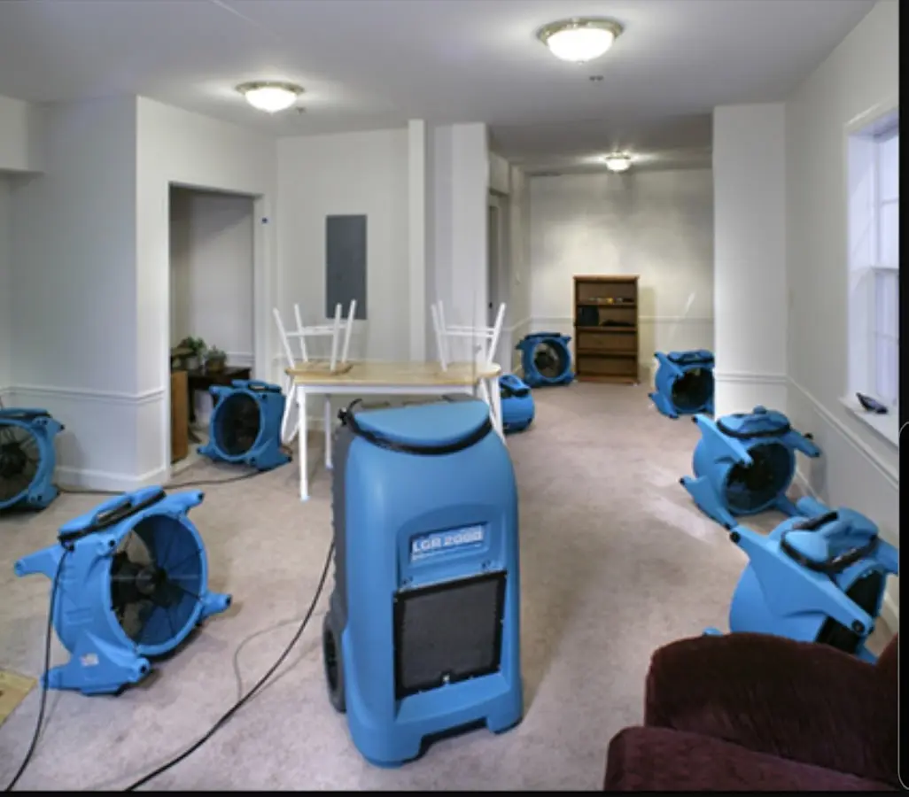 Air movers and dehumidifier setup for Water Damage Restoration in Michigan City